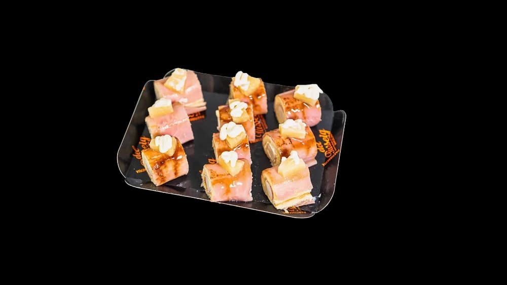 Canapé roll de jamón dulce